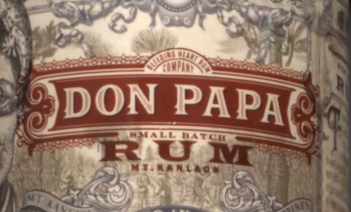 The same rum label, denoised and super-resolved four times