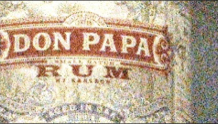 Noisy crop of a rum label from a single frame